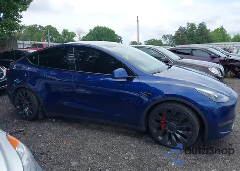 2023 Tesla Model Y Performance Dual Motor All-Wheel Drive z USA, uszkodzony, nr VIN 7SAYGDEF5PF700890